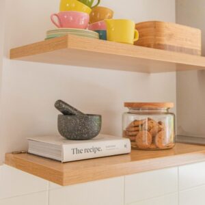 brown wooden shelf with assorted items